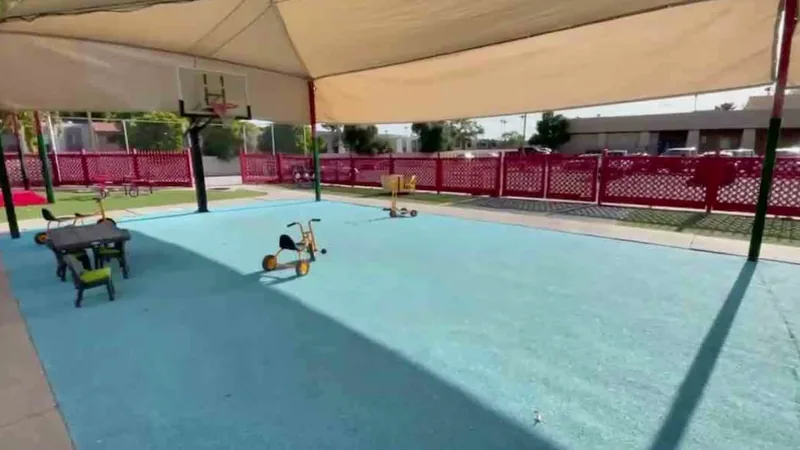 Nanas play yard tricycles under shade — Keep the routine the same
