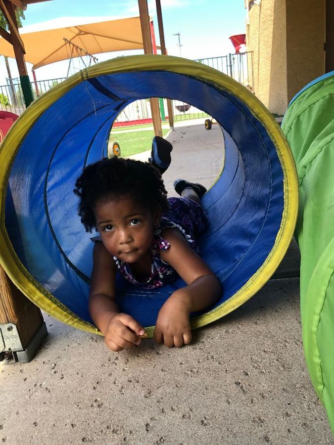 A child at Nana’s during daily activities