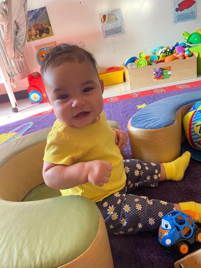 A baby in a bouncer at Nana&rsquo;s