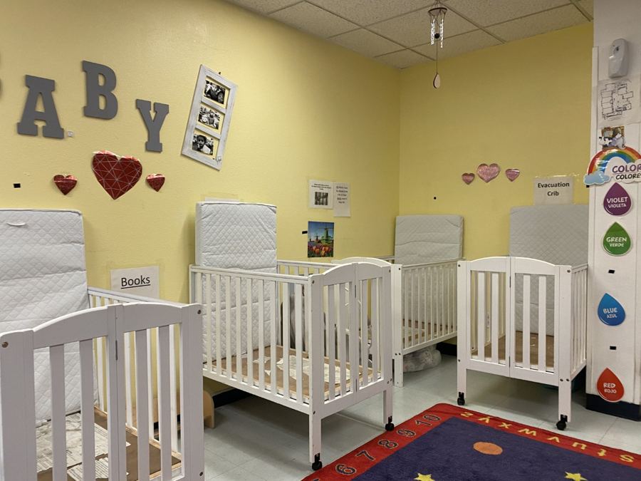 White cribs in the infant room